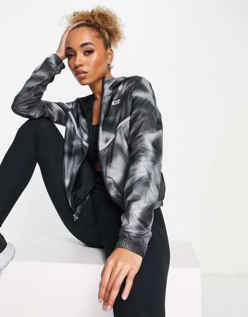 dagbog miljø flydende Nike Running all over print jacket in black | ASOS