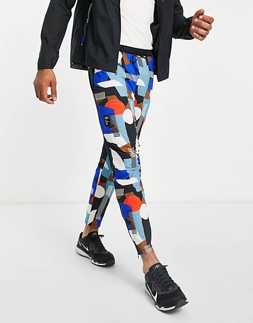 Nike Running - Artist in Residence - Joggers con stampa multicolore