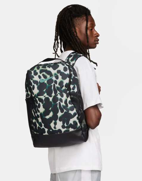 Nike Running Brasilia all over print back pack in navy