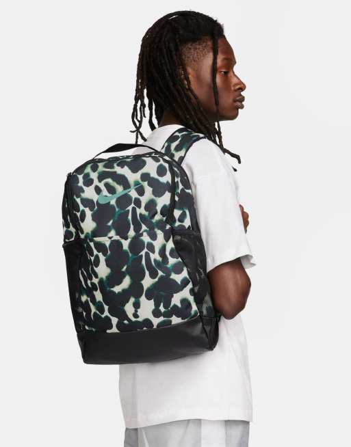 Nike Running Brasilia all over print back pack in navy | ASOS