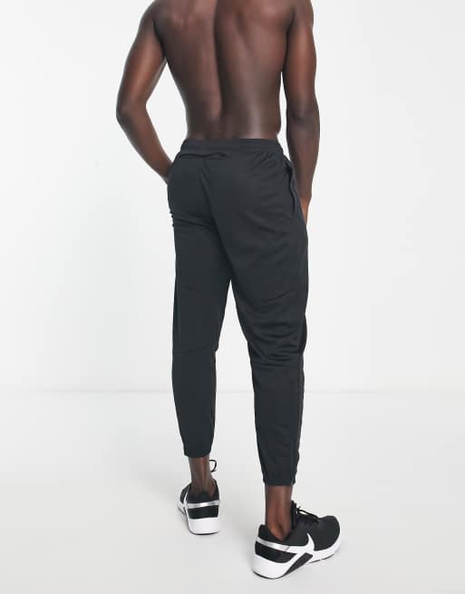 Nike Running Challeneger Repel Therma-FIT joggers in black ASOS
