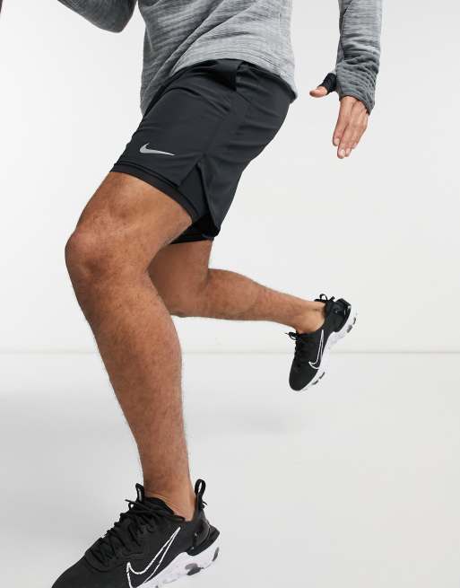 Nike Challenger 2-in-1 in black | ASOS