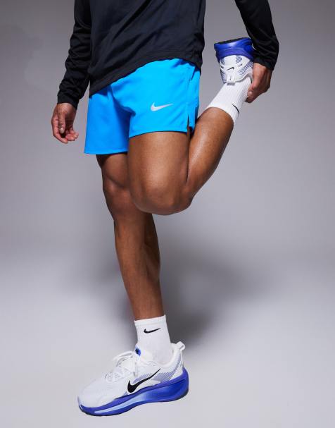 Nike Running Challenger Dri-FIT 5 inch shorts in blue
