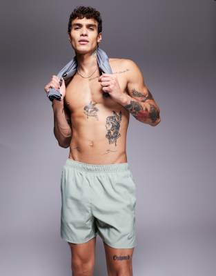 Nike Running Nike Running Challenger Dri-FIT 5 inch shorts in light green