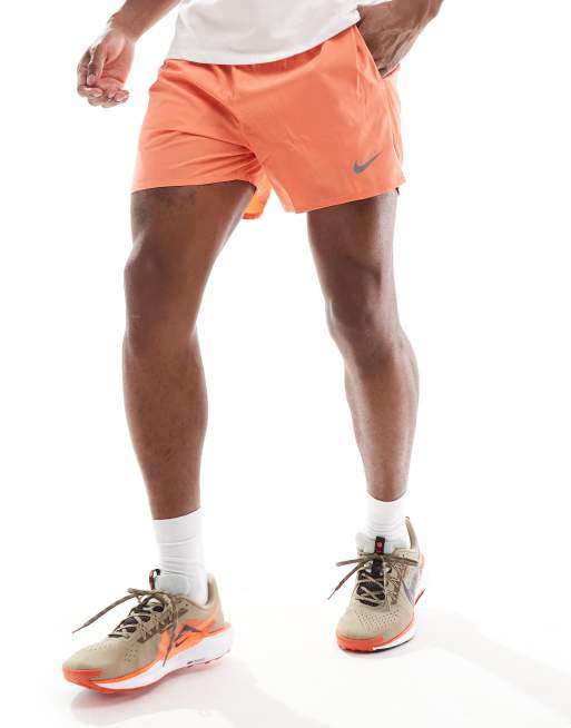 Nike Running Challenger Dri FIT 5 inch shorts in orange ASOS