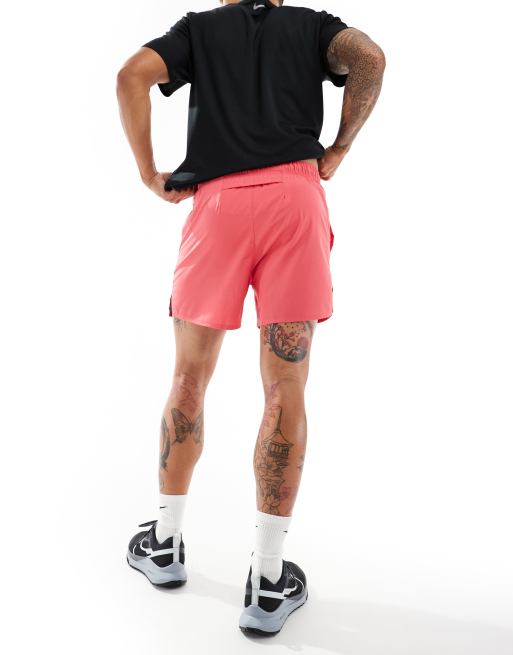 Nike Running Challenger Dri FIT 5 inch shorts in pink