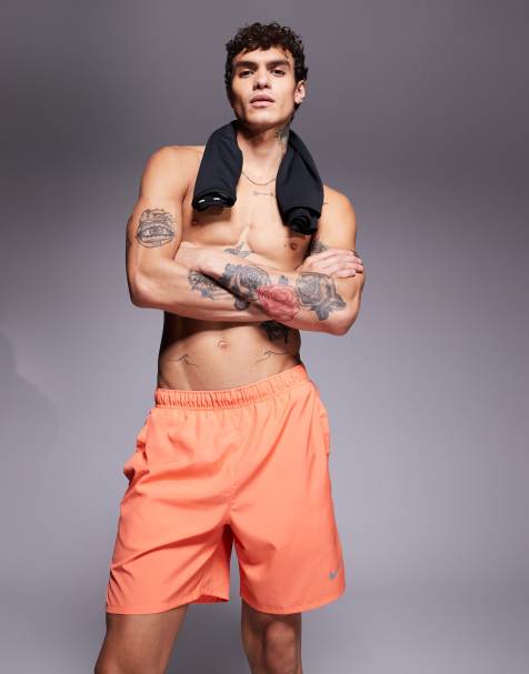 Nike Running Challenger Dri-FIT 7 inch shorts in orange - view 1