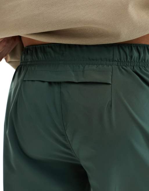 Nike Running Challenger Dri-FIT 9 inch shorts in green, 5 of 5