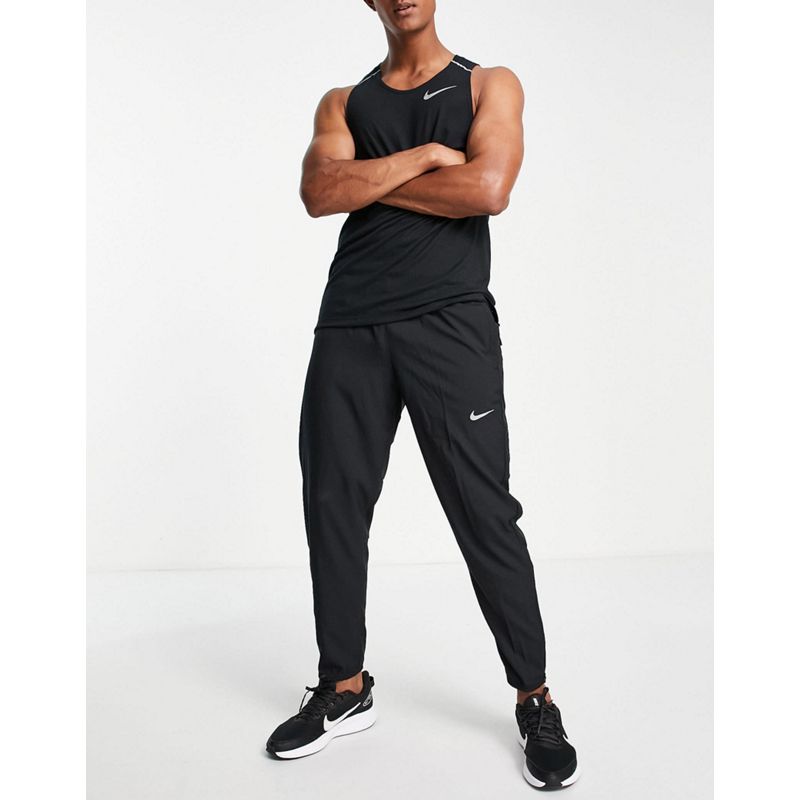 TxiJO Pantaloni e leggings Nike Running - Challenger Dri-FIT - Joggers neri
