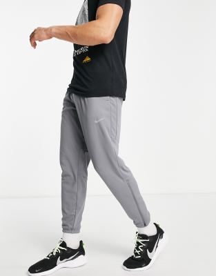 Nike Running Challenger Dri-FIT knitted sweatpants in black - BLACK