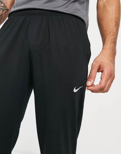 Nike Running Challenger Dri FIT knitted sweatpants in black