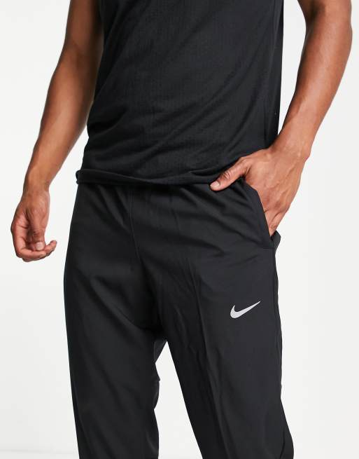 Nike Running Challenger Dri-FIT woven joggers in black