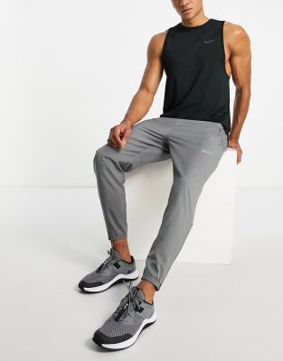 Nike Running Nike Running Challenger Dri-FIT woven joggers in grey