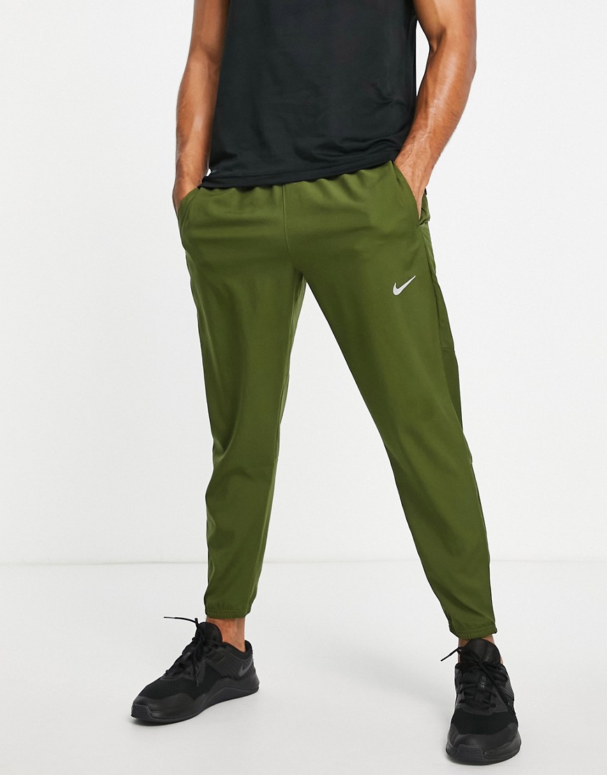 Nike Running Challenger Dri-FIT woven joggers in khaki-Green