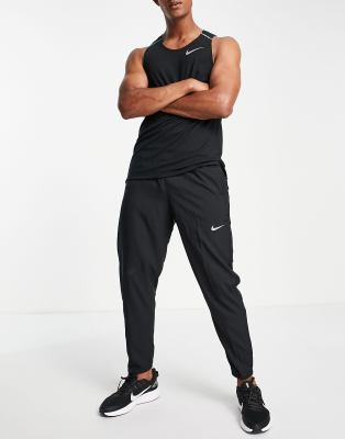 Nike Challenger Dri-fit Woven Sweatpants In Black In Black