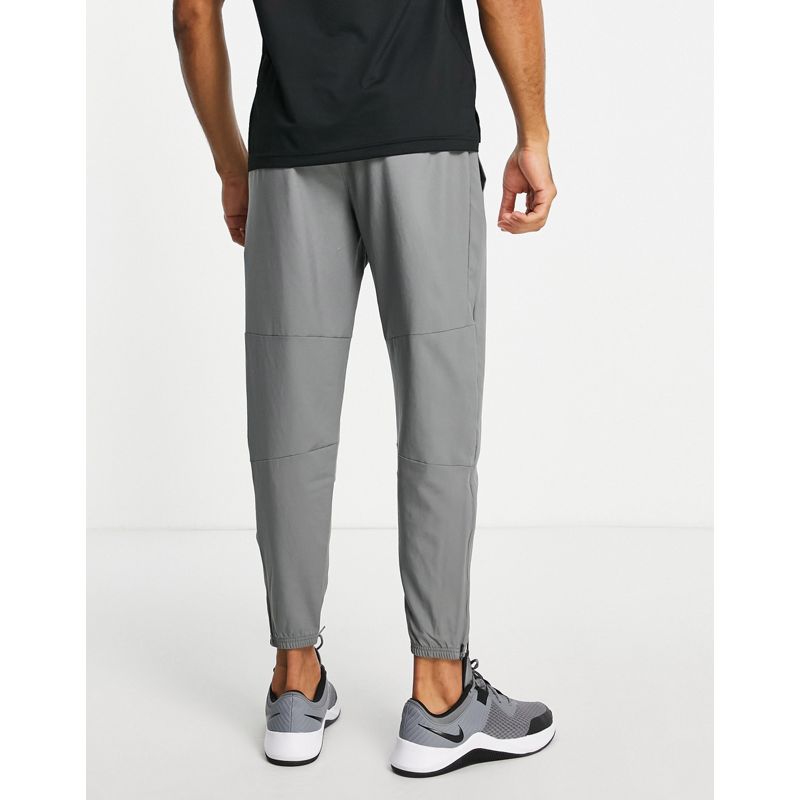 Uomo Pantaloni e leggings Nike Running - Challenger - Joggers Dri-FIT grigi
