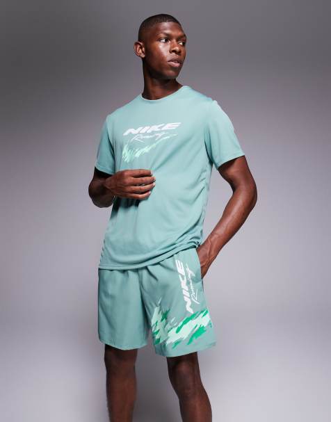 Nike Running Challenger Logo 5 inch shorts in green