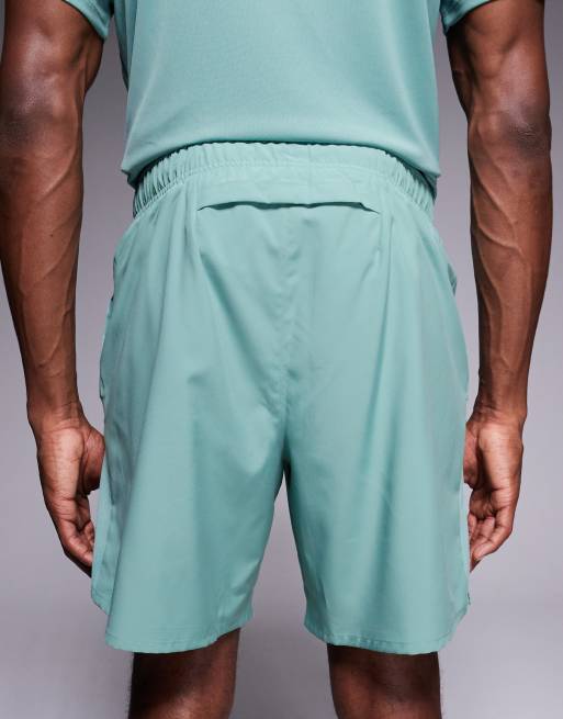 Nike Running Challenger Logo 5 inch shorts in green | ASOS