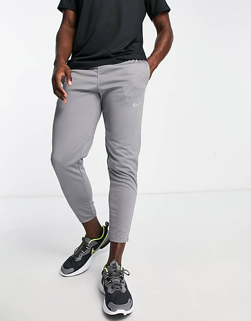 Nike Running - Challenger Repel - Pantalon de jogging en tissu Therma-FIT -  Gris