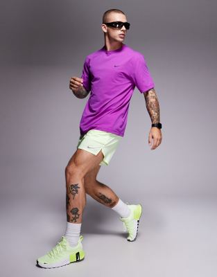 Nike Running - Challenger - Short 7 pouces en tissu Dri-FIT - Vert
