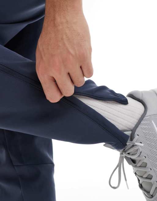 Nike Running Challenger woven sweatpants in navy