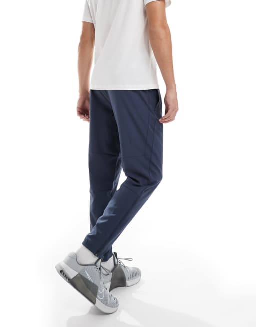 Nike Running Challenger woven sweatpants in navy