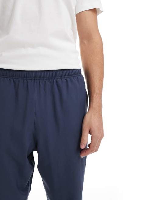 Nike Running Challenger woven sweatpants in navy, 4 of 5