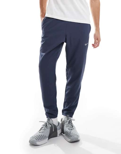 Nike Running Challenger woven sweatpants in navy
