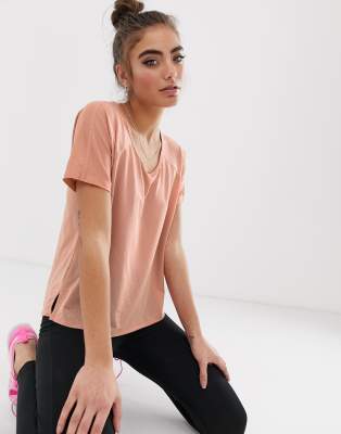 pink and gold nike shirt