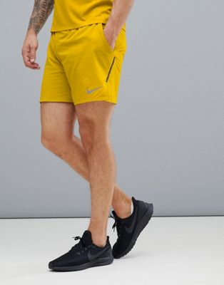 nike running shorts yellow