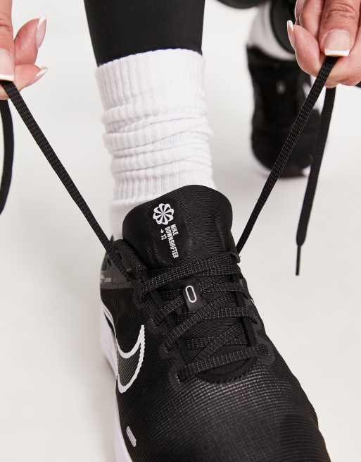 Nike Running Downshifter 12 Sneakers bianche e nere ASOS