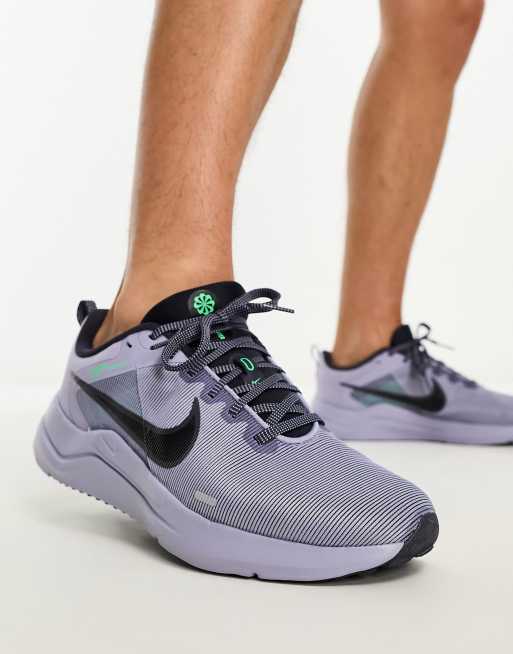 Nike store running grigie