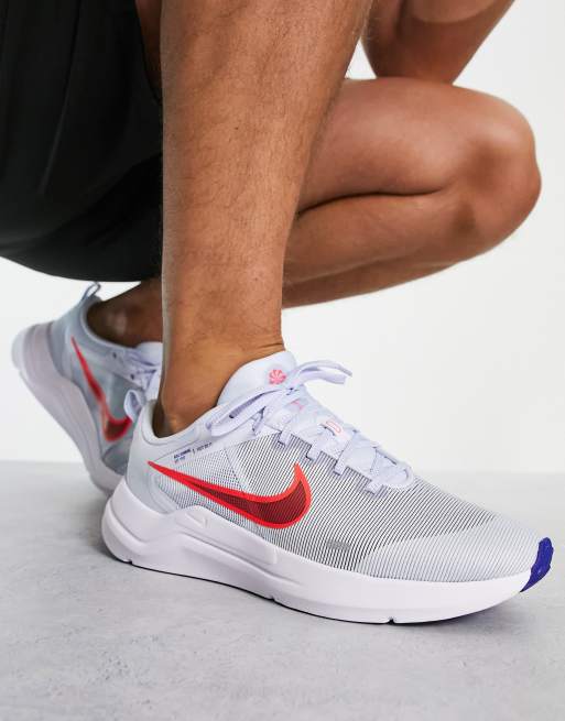 Nike Running Downshifter 12 sneakers in white and red