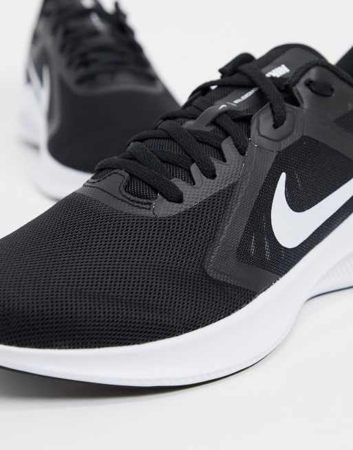 Tenis nike store masculino downshifter 9