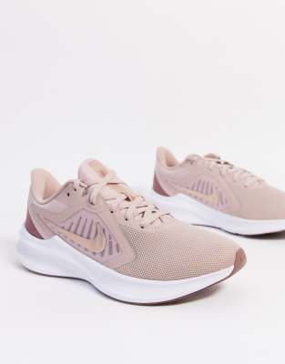 nike running downshifter trainers in pink