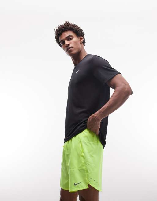 Nike Running Dri-Fit 7-inch shorts in lime green , 3 of 5