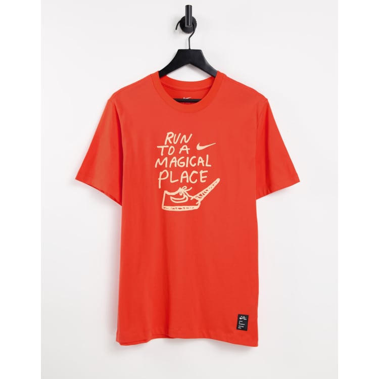 Nike Running Dri-FIT Nathan Bell graphic T-shirt in orange