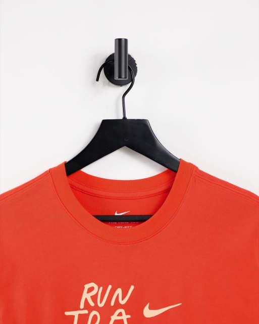 Nike Running Dri-FIT A.I.R. Nathan Bell graphic T-shirt in orange