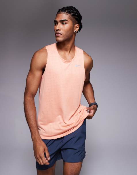 Nike Running Dri-FIT Breathe Miler tank top in orange - view 1