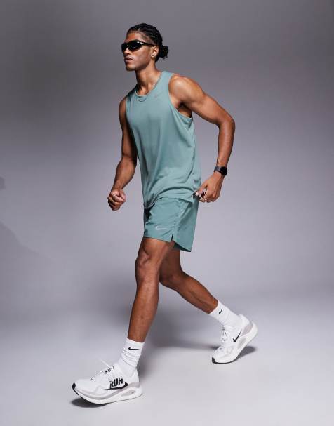 Nike Running Dri-FIT Challenger 5 inch shorts in green - view 1