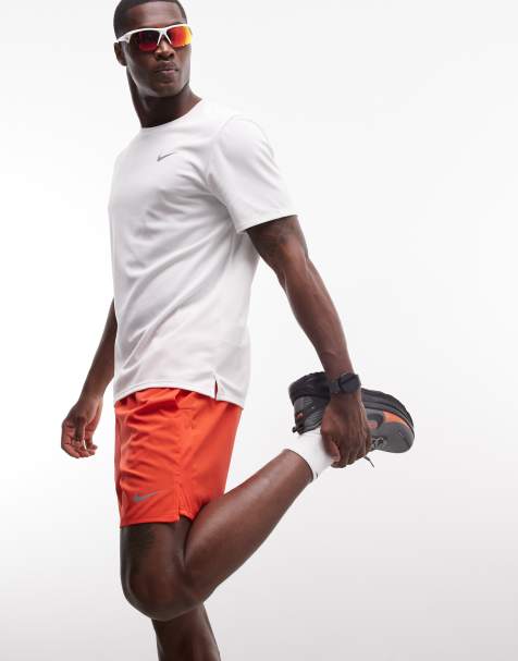 Nike Running Dri-FIT Challenger shorts in red - view 1