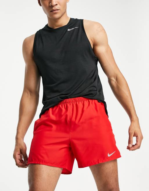 Red nike running store shorts