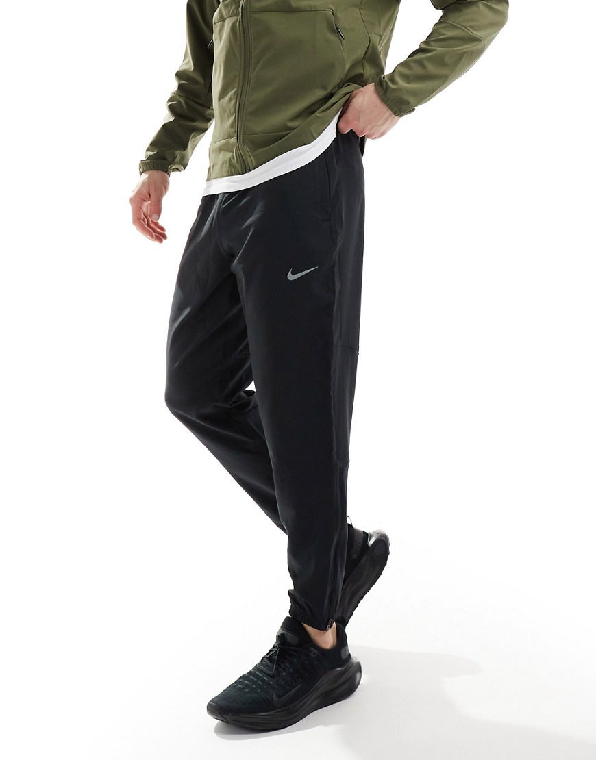 Nike Running Dri-Fit Challenger woven jogger in black