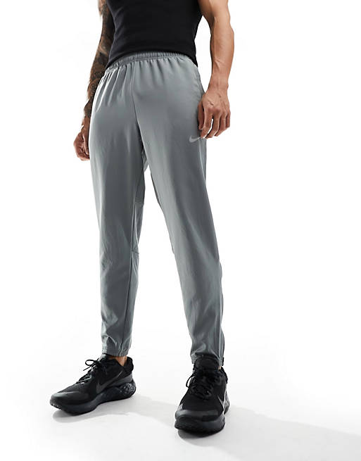 Nike Running Dri-Fit Challenger woven jogger in grey