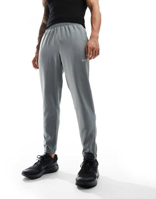 NIKE SPORTSWEAR ESSENTIAL WOVEN JOGGER