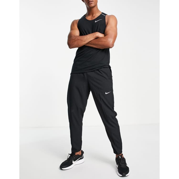 Nike Running Dri-FIT Challenger woven sweatpants in black - BLACK