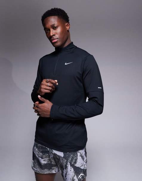 Nike Running DRI-FIT Element zip long sleeve top in black