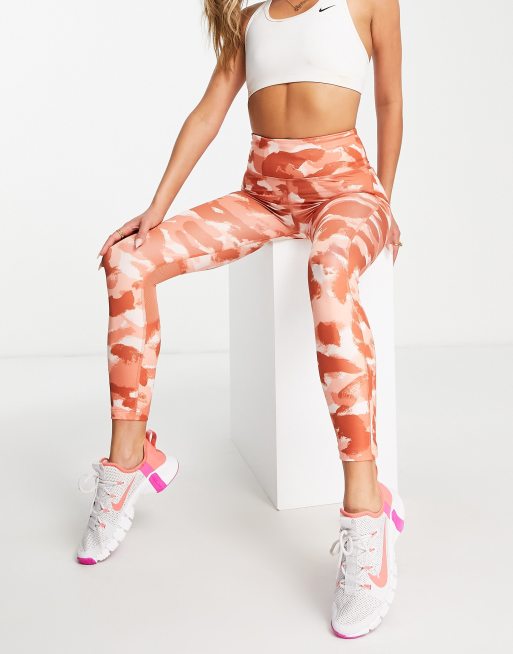 Nike Running Dri-FIT Fast mid rise camo leggings in pink