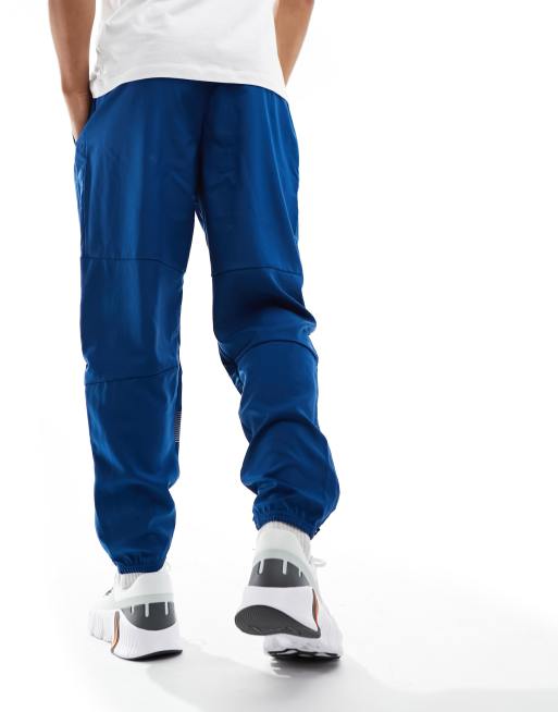 Nike tech pants discount reflective