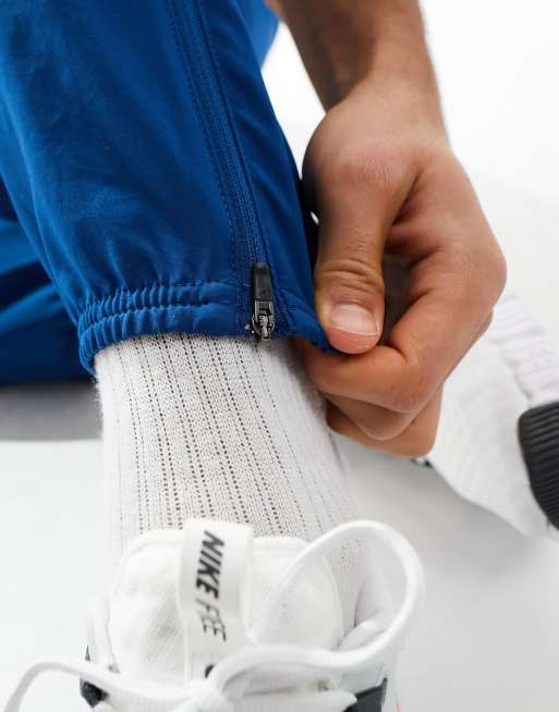 Nike Running Dri-Fit Flash Challenger reflective woven joggers in blue , 5 of 5